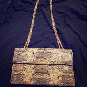 Henri Bendel wallet on a chain